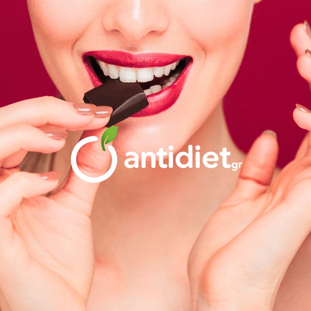 Διατροφή χωρίς δίαιτες: Γυναίκα απολαμβάνει σοκολάτα ως μέρος μιας φιλοσοφίας διατροφής χωρίς δίαιτες, που προάγει την ισορροπία και την απόλαυση στο φαγητό.